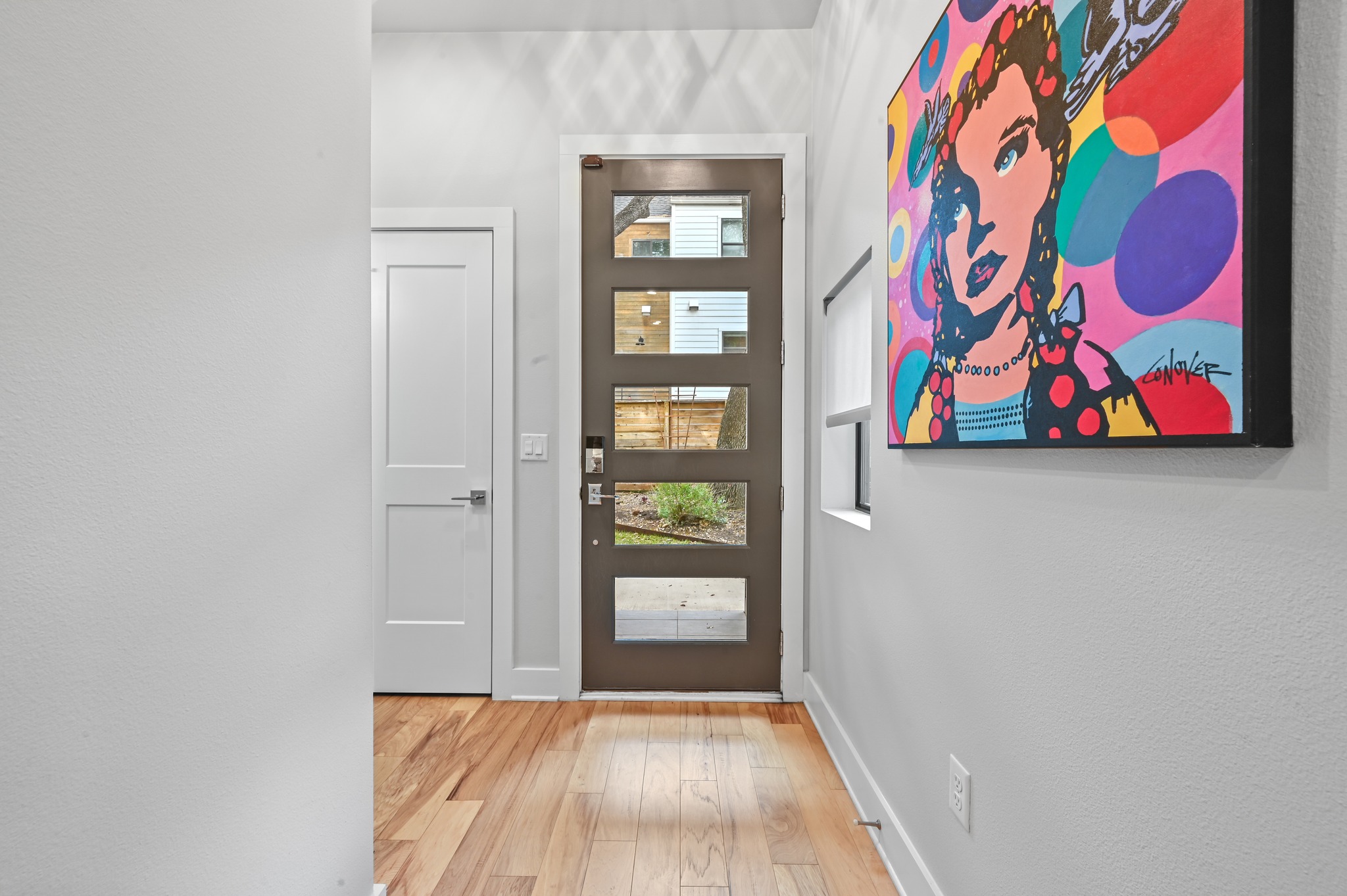 3115 Clawson Road, Unit 201 Austin, TX 78704 - Photo 7 of 38 a view of front door with wooden floor