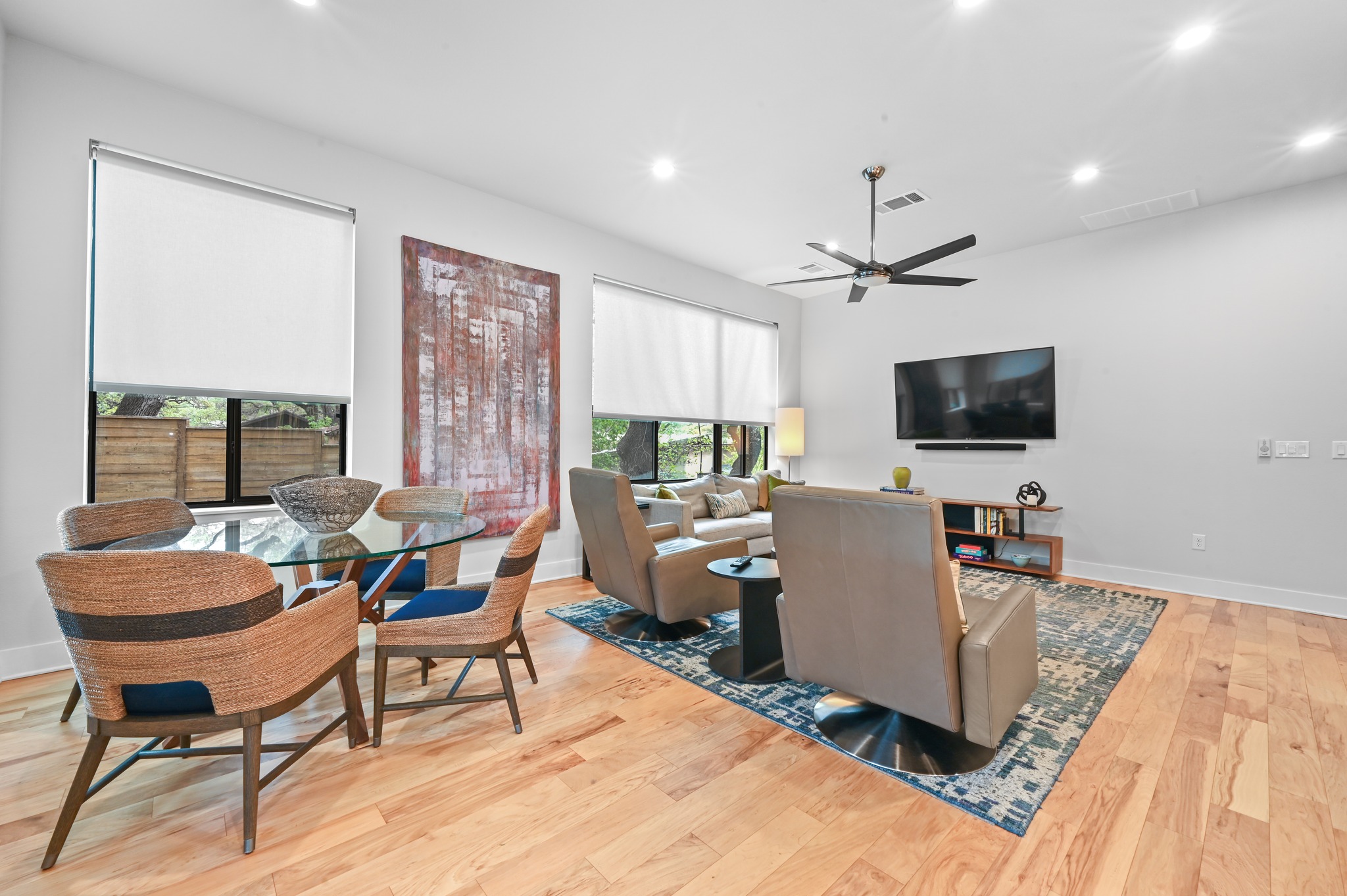 3115 Clawson Road, Unit 201 Austin, TX 78704 - Photo 10 of 34 Open-concept living space featuring light wood-finish flooring, recessed lighting, and a contemporary ceiling fan