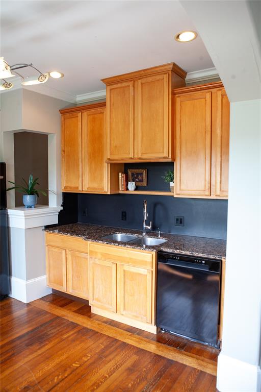 5347 Lewis Street, Unit 5345 Dallas, TX 75206 - Photo 15 of 37 a kitchen with stainless steel appliances granite countertop a stove a sink and a microwave