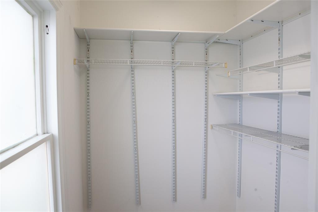 5347 Lewis Street, Unit 5345 Dallas, TX 75206 - Photo 20 of 37 a view of walk in closet with empty racks