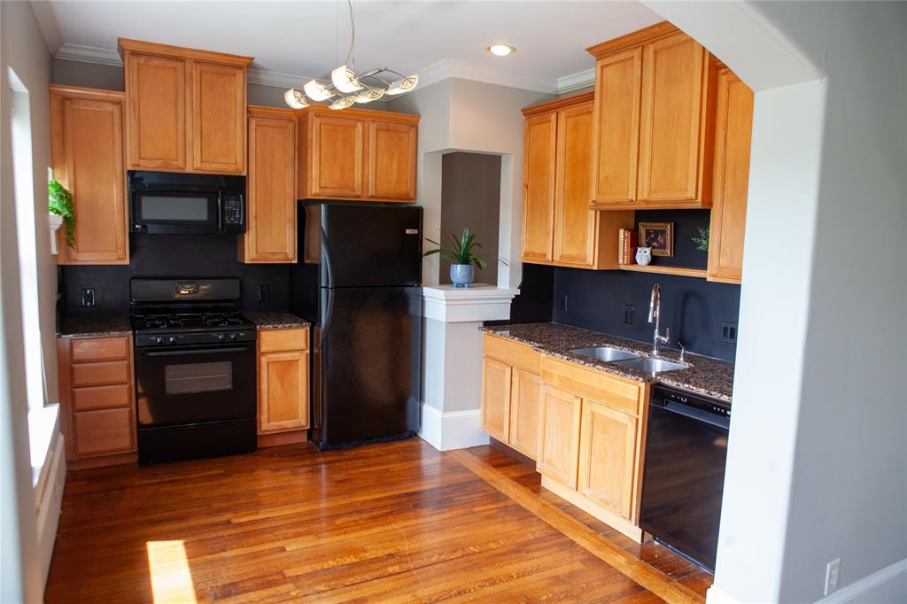 5347 Lewis Street, Unit 5345 Dallas, TX 75206 - Photo 2 of 37 a kitchen with stainless steel appliances granite countertop a refrigerator stove and oven