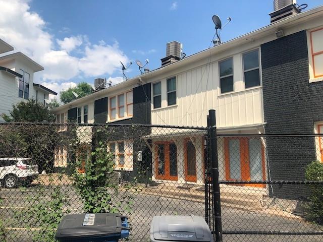 5347 Lewis Street, Unit 5345 Dallas, TX 75206 - Photo 31 of 32 Gated, assigned parking at the rear of the building, accessible from the alley.