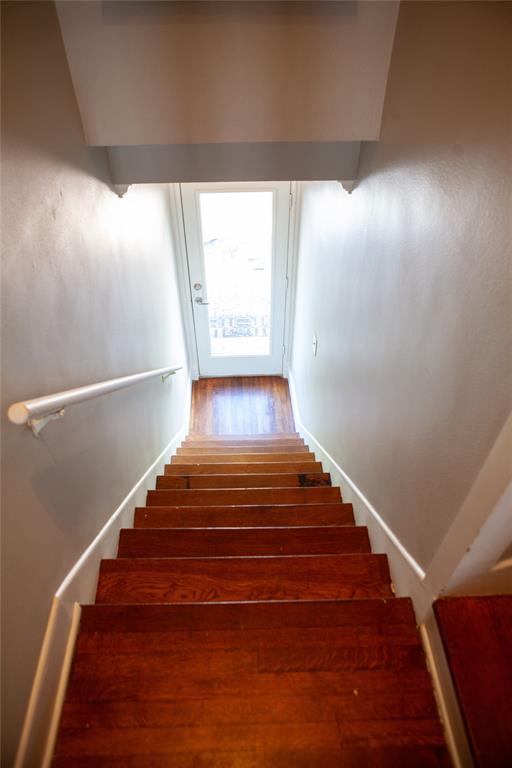 5347 Lewis Street, Unit 5345 Dallas, TX 75206 - Photo 31 of 37 Stairs leading down to the back parking lot.