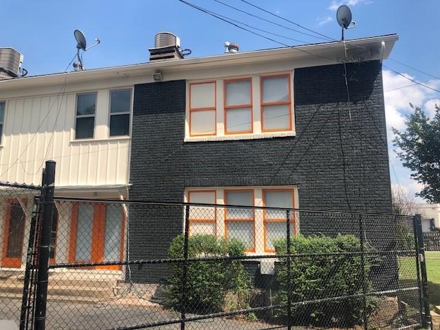 5347 Lewis Street, Unit 5345 Dallas, TX 75206 - Photo 32 of 32 Electric gate accessible with a key fob provides added safety and security.