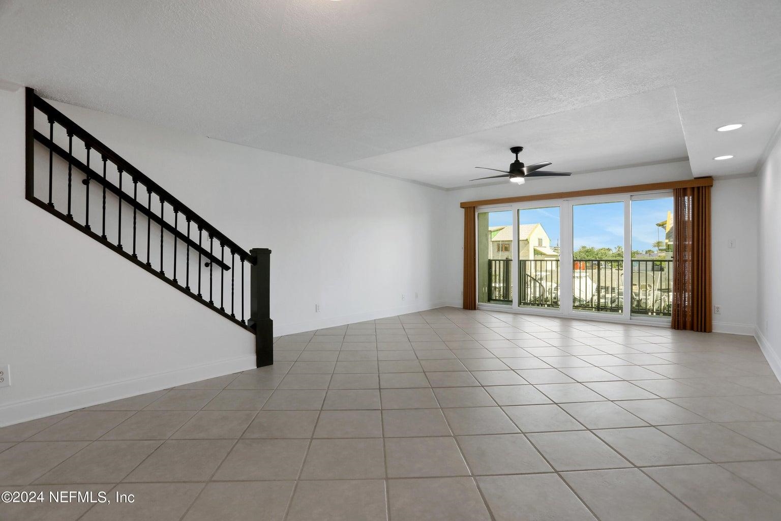 120 Sunset Harbor Way, Unit 206 St. Augustine, FL 32080 - Photo 13 of 54 a view of an empty room with windows