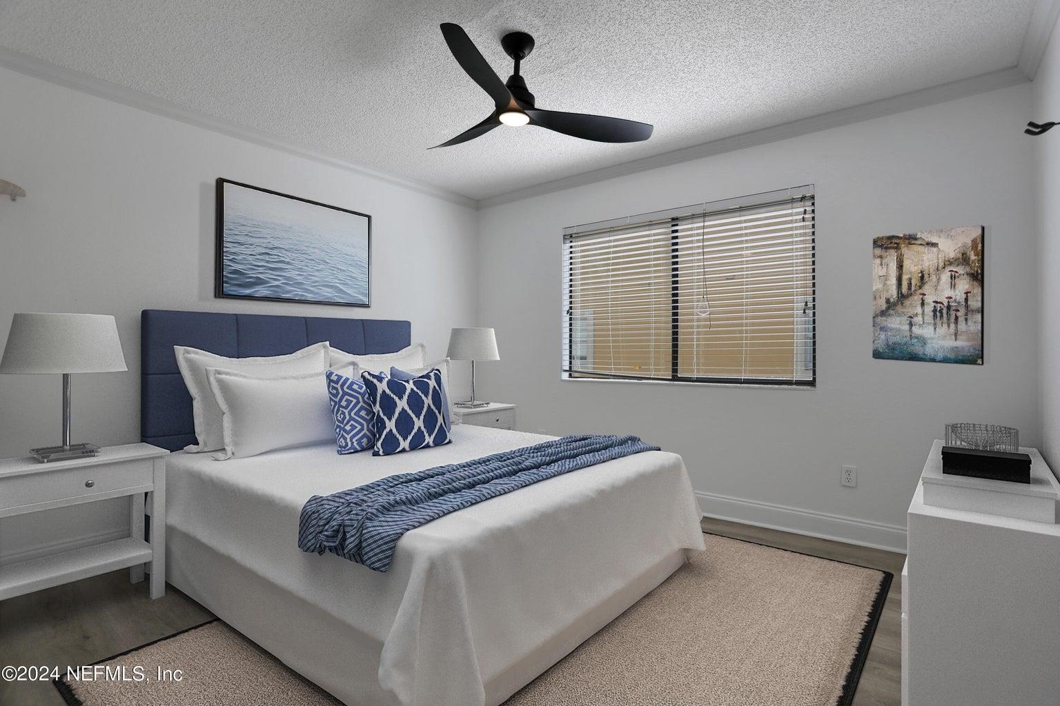 120 Sunset Harbor Way, Unit 206 St. Augustine, FL 32080 - Photo 19 of 54 a bedroom with bed and a window