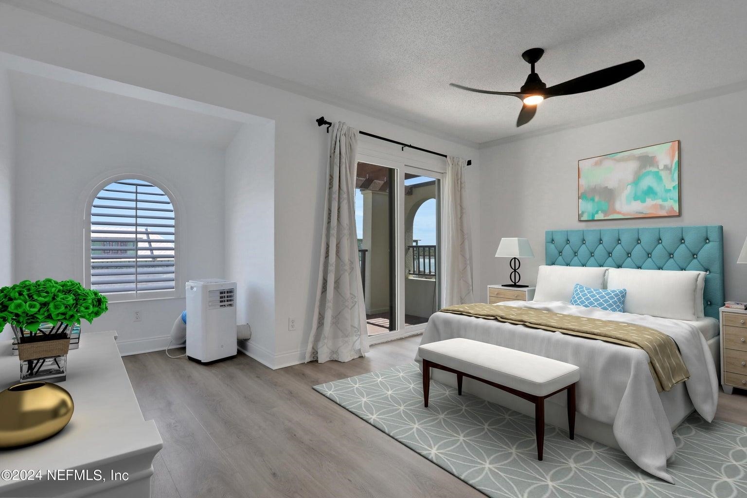 120 Sunset Harbor Way, Unit 206 St. Augustine, FL 32080 - Photo 22 of 54 a bedroom with a bed and a potted plant