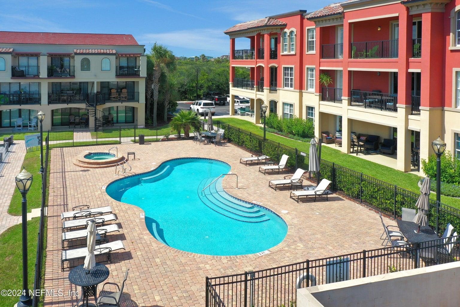 120 Sunset Harbor Way, Unit 206 St. Augustine, FL 32080 - Photo 40 of 54 a view of a house with swimming pool and porch