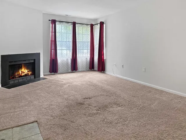 a view of a kitchen with a sink