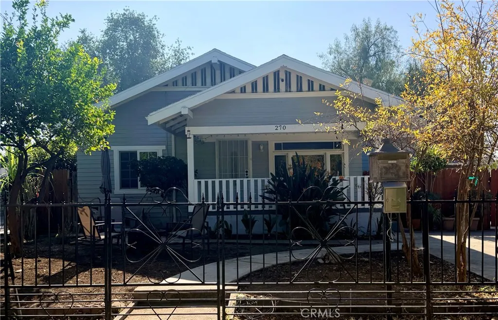 a front view of a house with yard