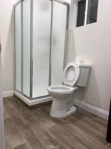 a bathroom with a toilet and a sink