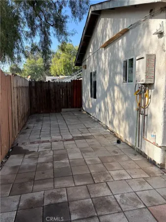 a view of a backyard of a house