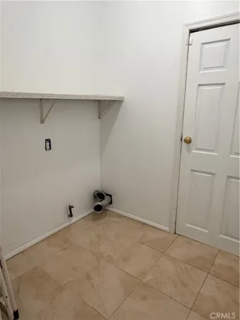 a view of kitchen with granite countertop cabinets and sink