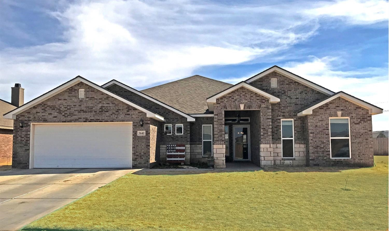 3641 Ridgely Lubbock, TX 79407 - Photo 1 of 10 a view of a house with wooden fence