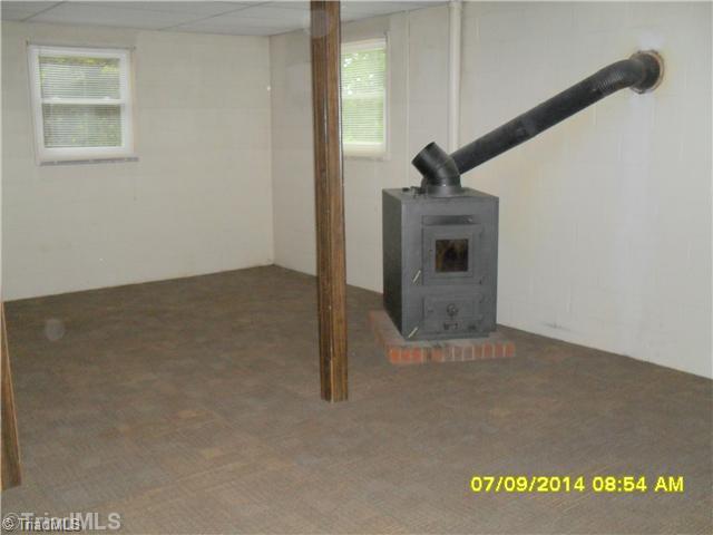 691 Allred Road Lexington, NC 27292 - Photo 12 of 16 Den/Family/Great Room. Recent woodstove in basement can heat the whole house!