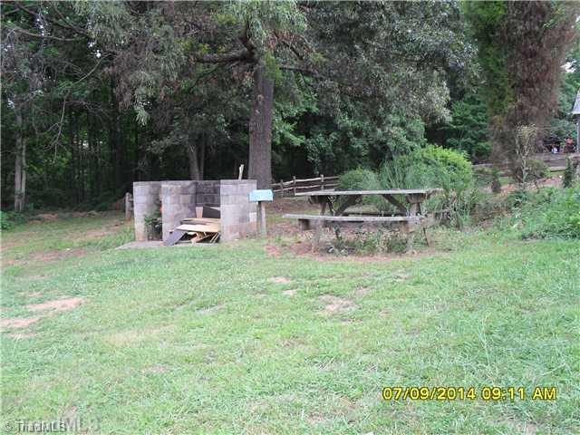 691 Allred Road Lexington, NC 27292 - Photo 14 of 16 Yard/Garden. Grilling area with picnic table for cookouts and family gatherings!