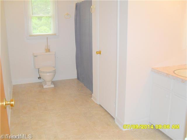 691 Allred Road Lexington, NC 27292 - Photo 10 of 16 Other Bath. Hall bathroom has tub and shower combo, linen storage, double sinks and new paint!