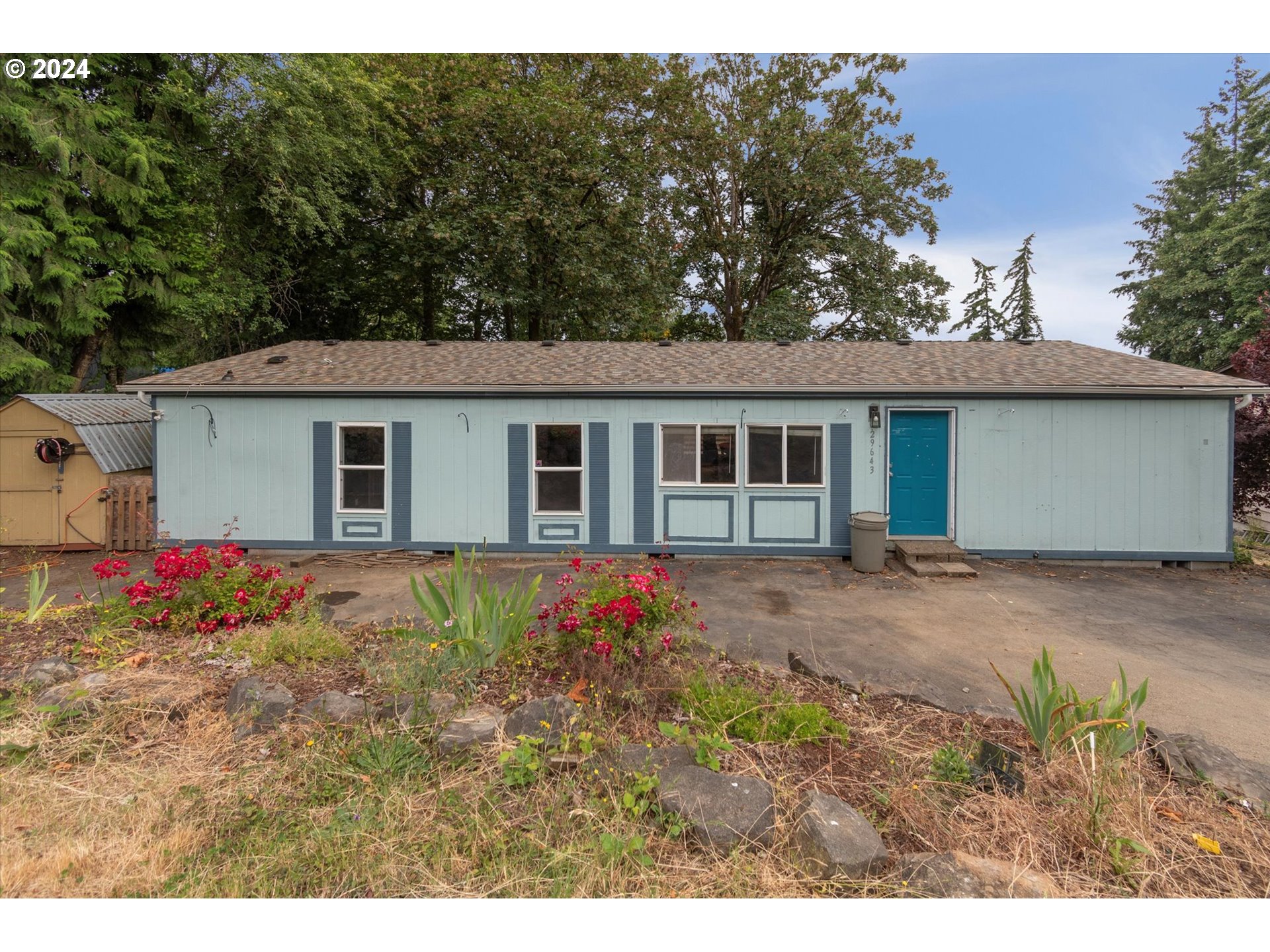 29643 View Street Rainier, OR 97048 - Photo 1 of 31 a front view of house with yard and trees around