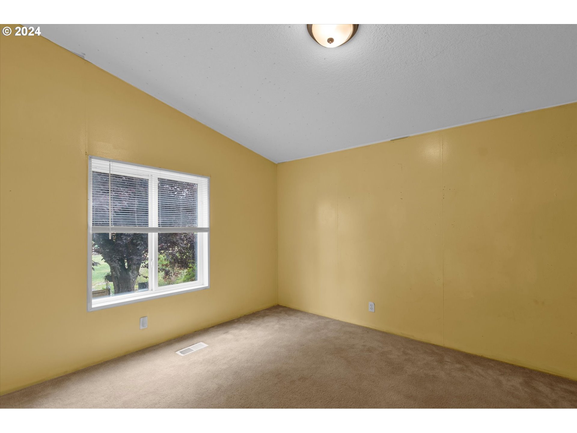 29643 View Street Rainier, OR 97048 - Photo 22 of 31 a view of an empty room with a window
