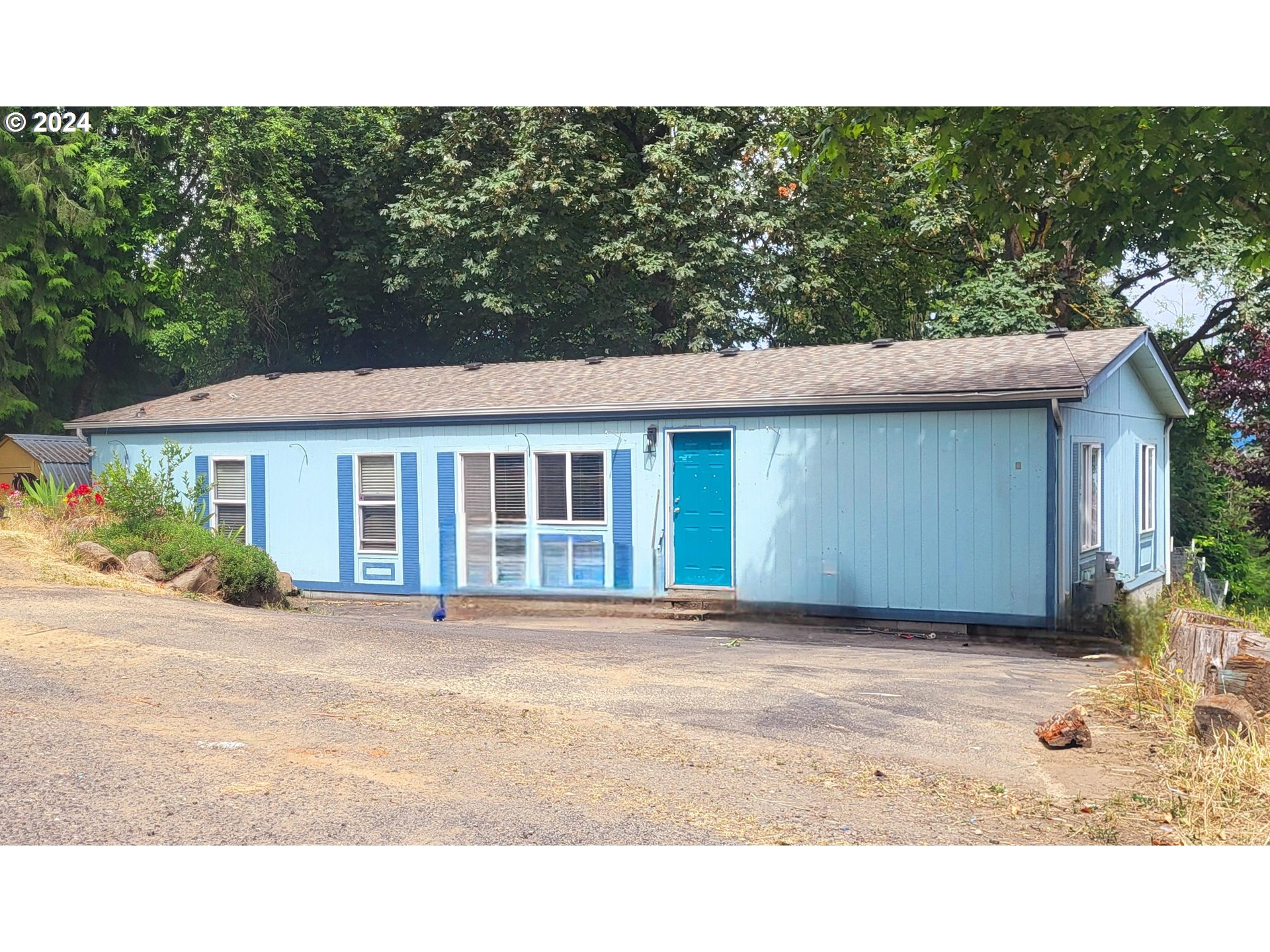 29643 View Street Rainier, OR 97048 - Photo 31 of 31 a front view of a house with a garden