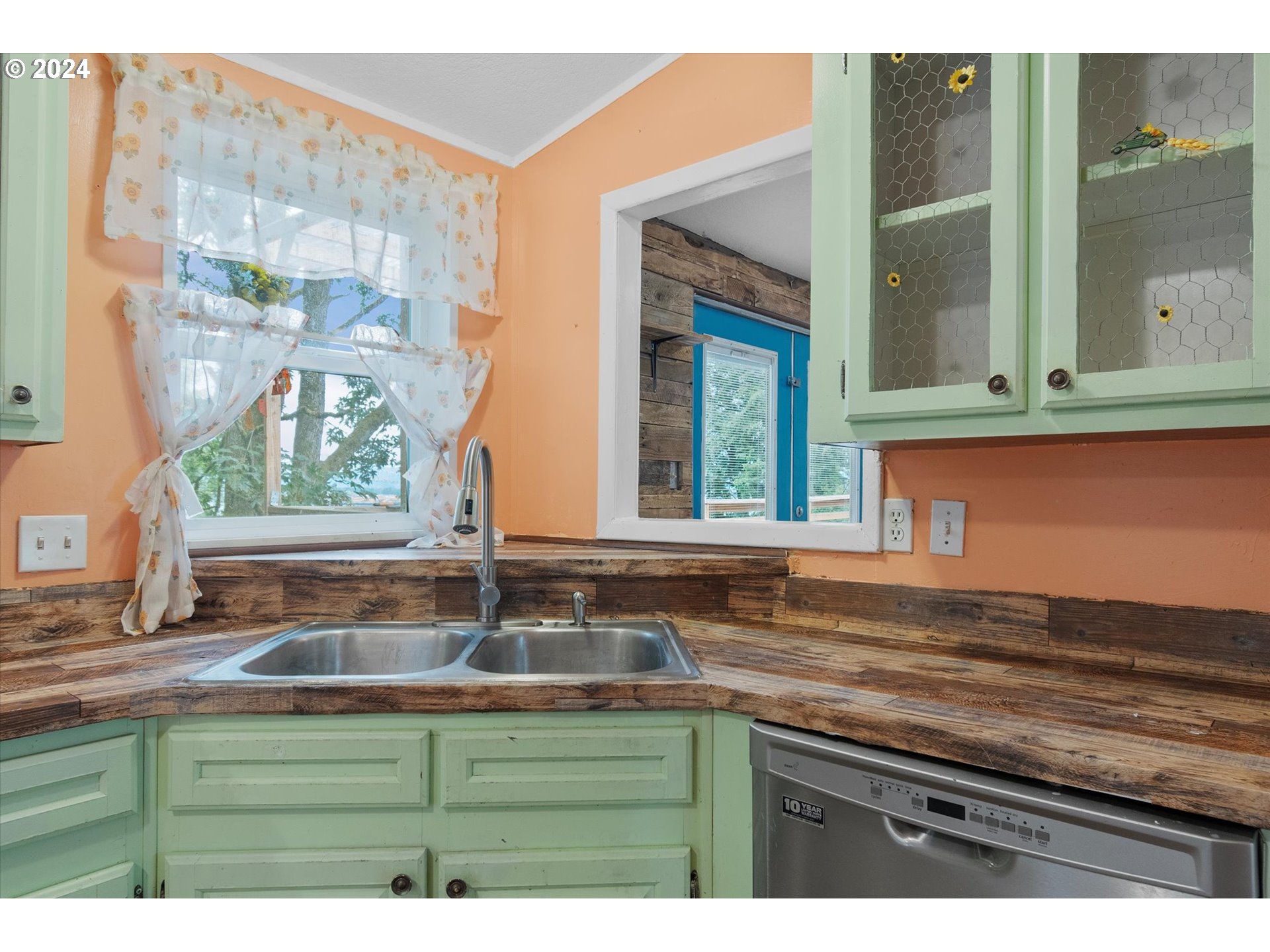 29643 View Street Rainier, OR 97048 - Photo 10 of 31 a kitchen sink with a granite countertop window and sink