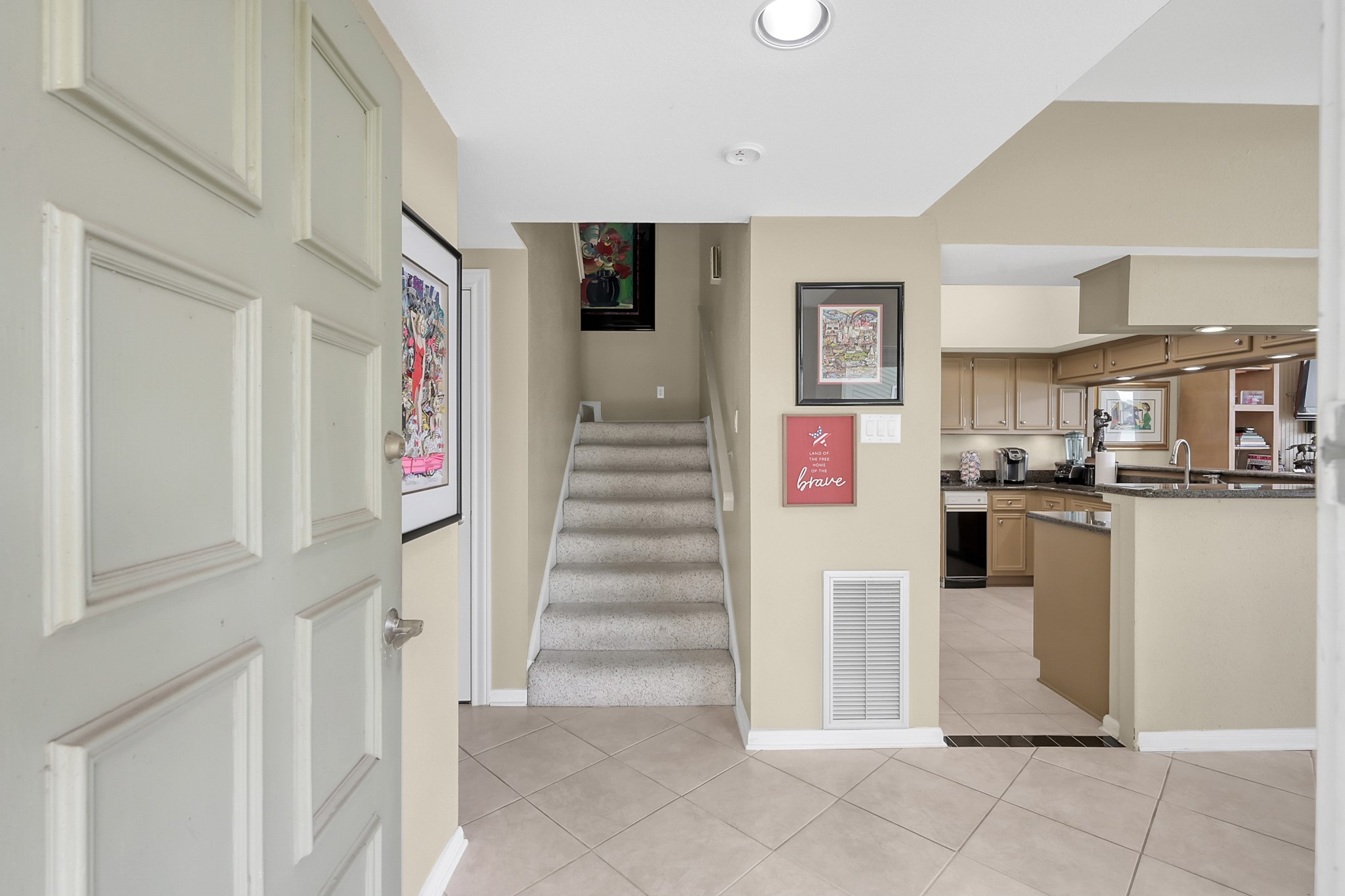 63 April Point Drive South Montgomery, TX 77356 - Photo 16 of 28 Entryway leading to kitchen & stairway to 2nd floor