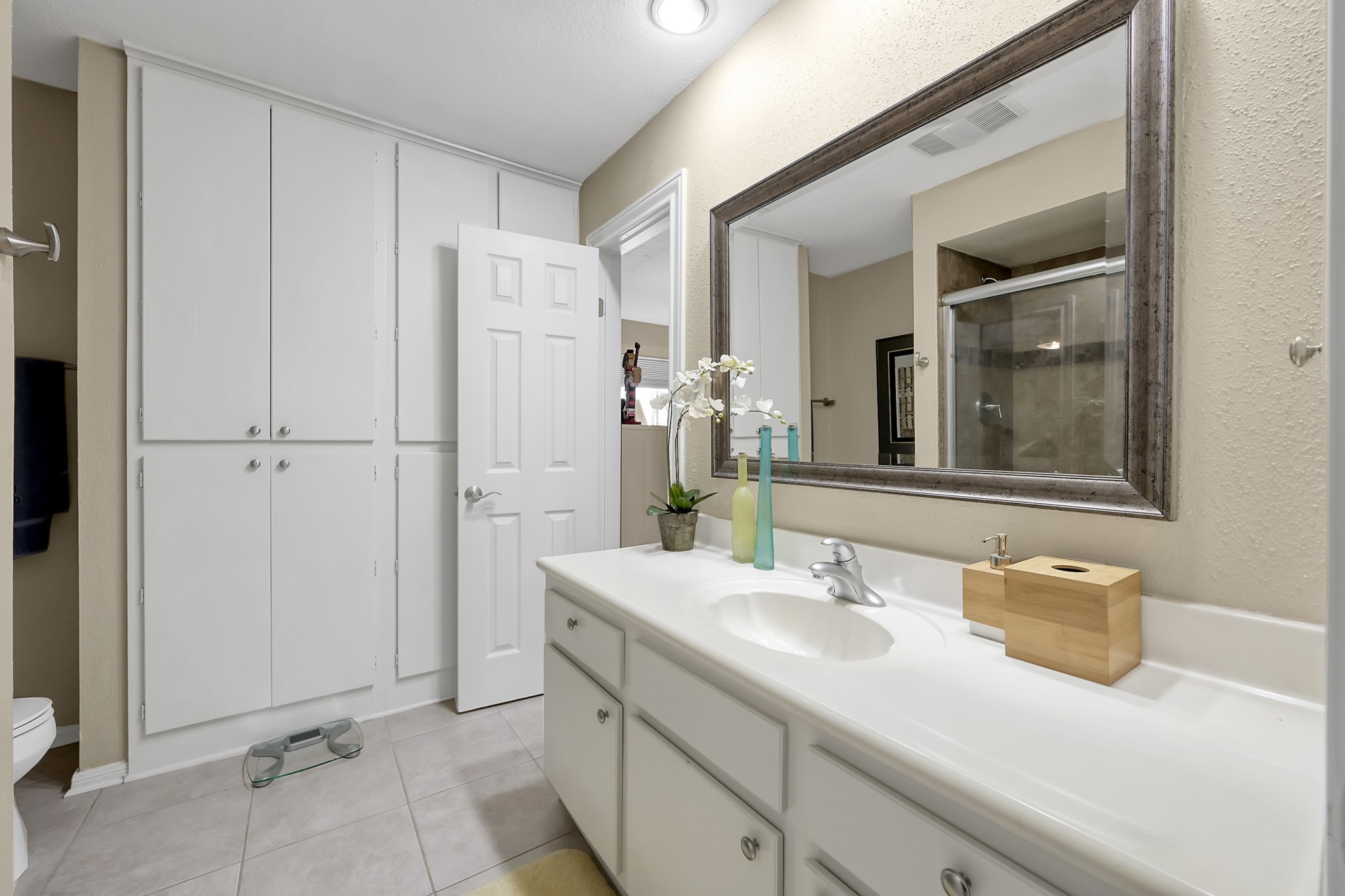 63 April Point Drive South Montgomery, TX 77356 - Photo 21 of 28 Second story bath includes this fabulous storage wall