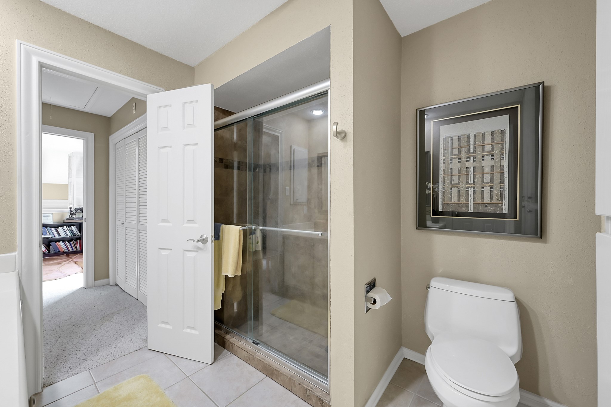 63 April Point Drive South Montgomery, TX 77356 - Photo 22 of 28 Like the primary bath, this one also has an upgraded shower with bench seating