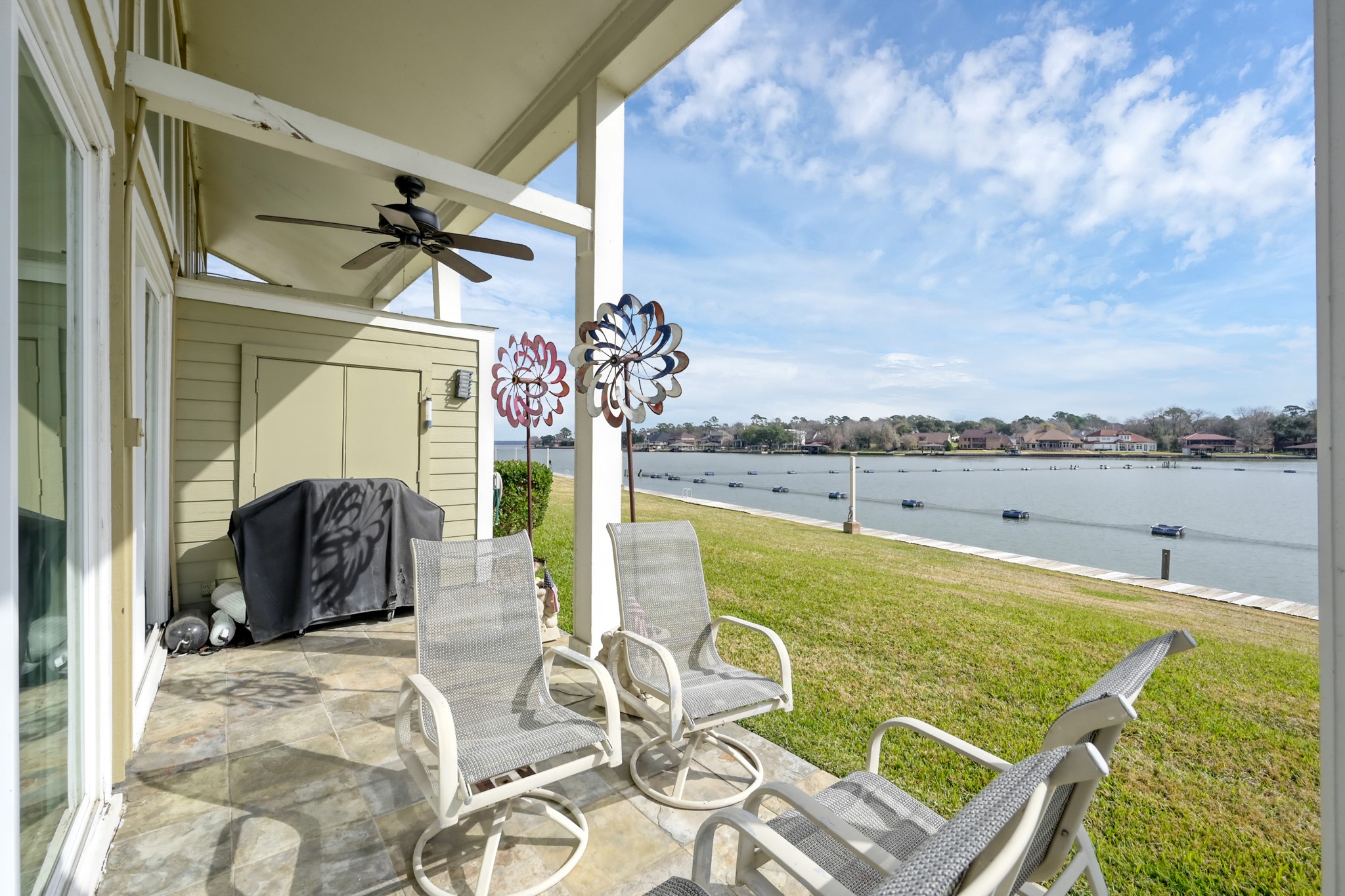 63 April Point Drive South Montgomery, TX 77356 - Photo 25 of 28 The waterside patio offers an ideal setting for entertaining guests.