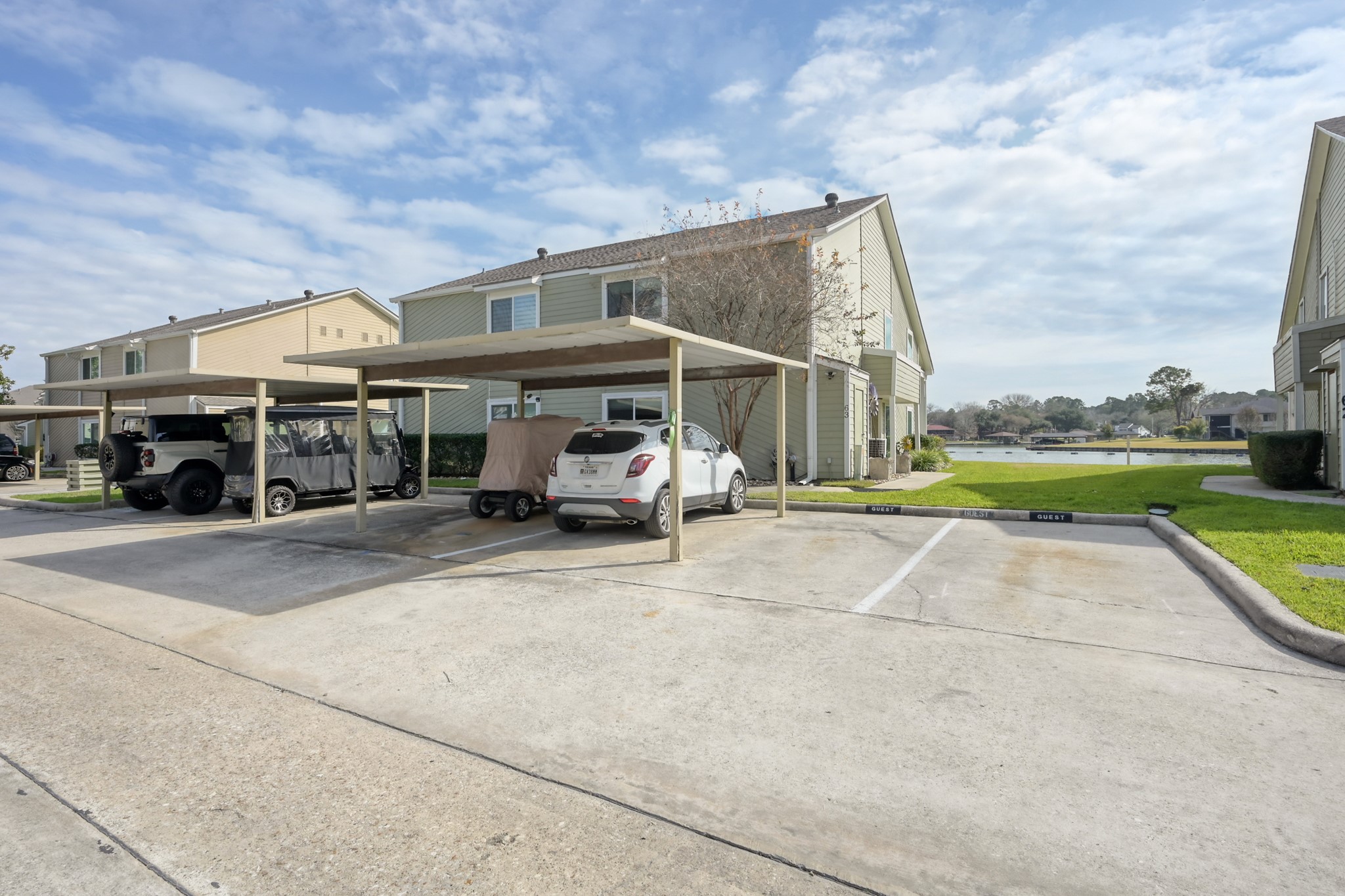 63 April Point Drive South Montgomery, TX 77356 - Photo 28 of 28 2 assigned covered parking spaces, as well as convenient visitor parking