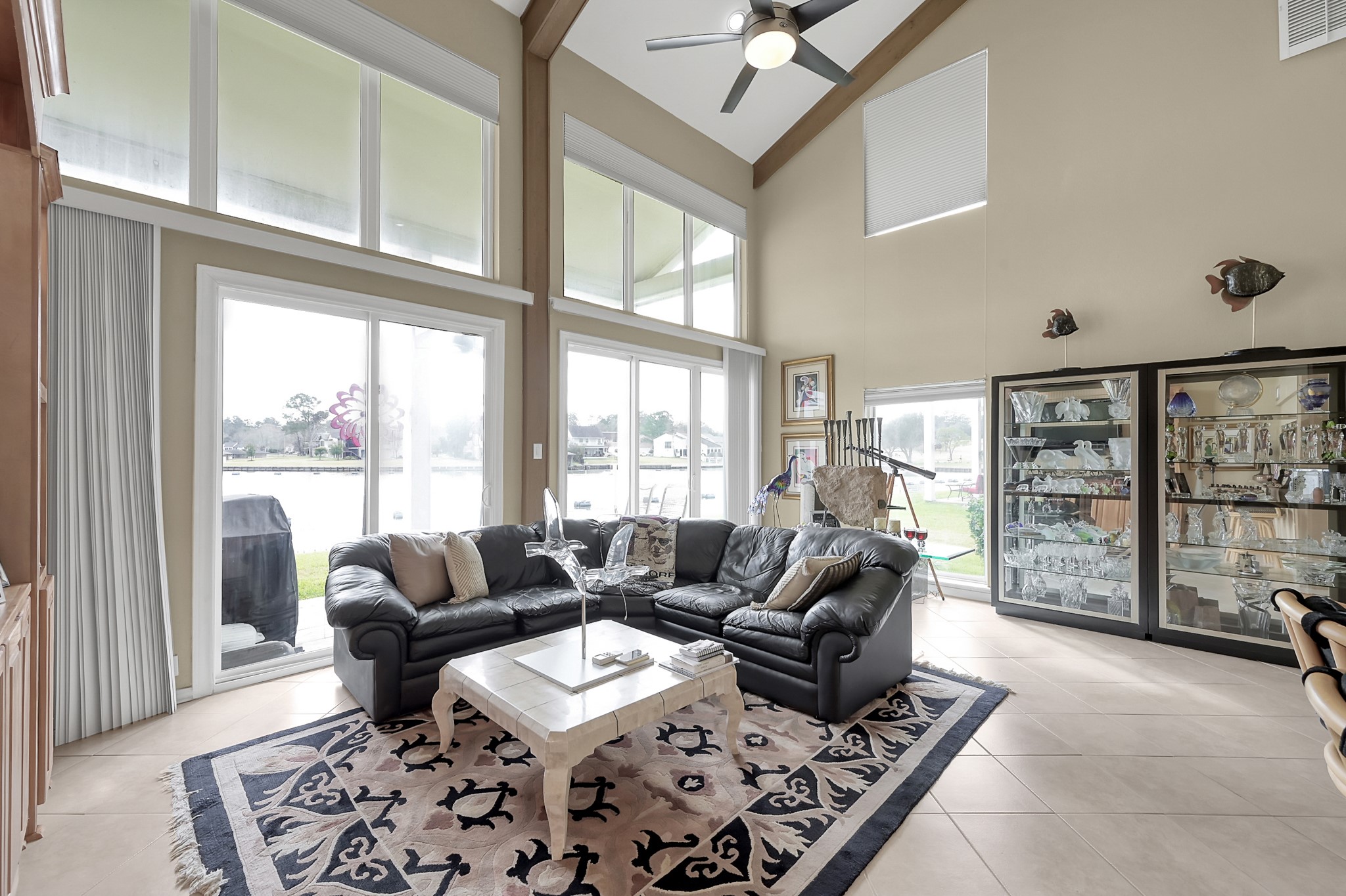 63 April Point Drive South Montgomery, TX 77356 - Photo 4 of 28 Living space has tile flooring & soaring ceilings