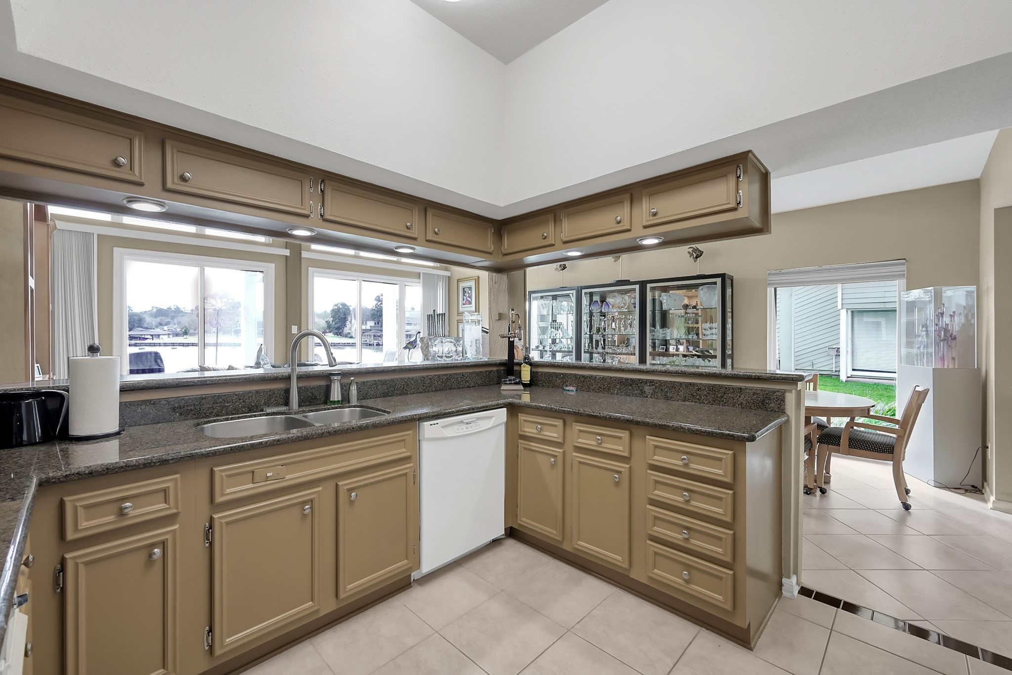 63 April Point Drive South Montgomery, TX 77356 - Photo 6 of 28 Kitchen overlooks the panoramic lake views