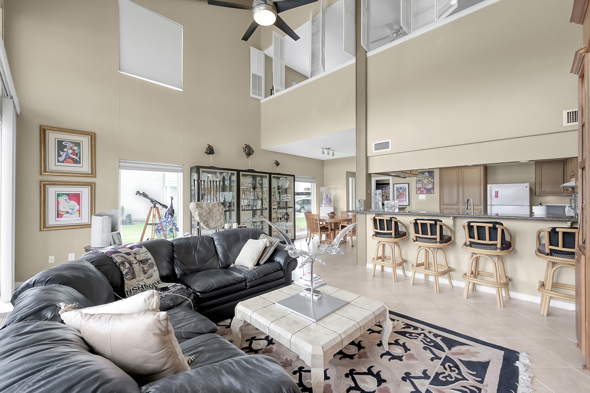 63 April Point Drive South Montgomery, TX 77356 - Photo 9 of 28 Living space looking toward the front door. This view showcases the additional windows you gwt with a corner unit