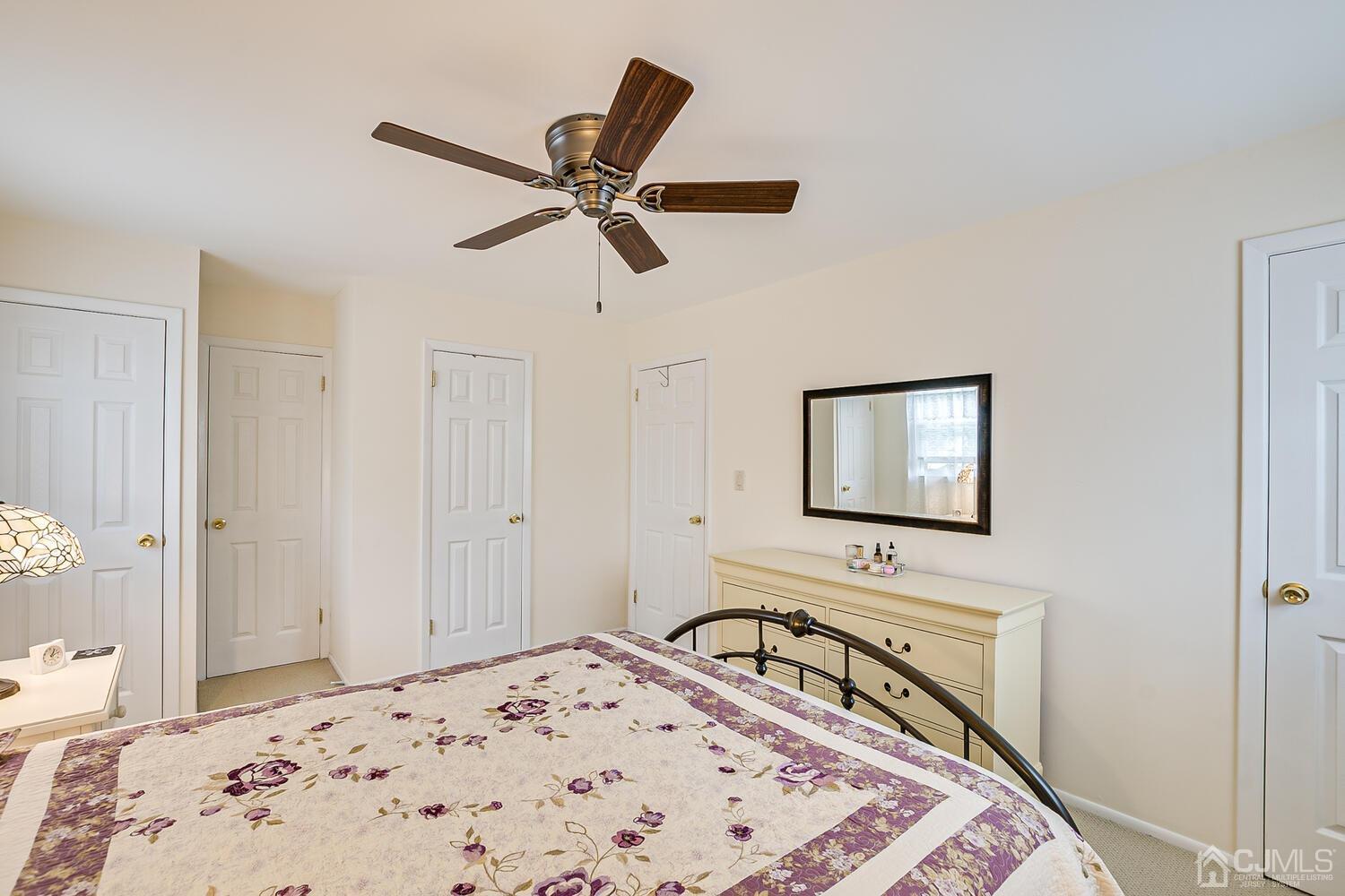 150 Vineyard Road Edison, NJ 08817 - Photo 25 of 33 a bedroom with a bed and a window