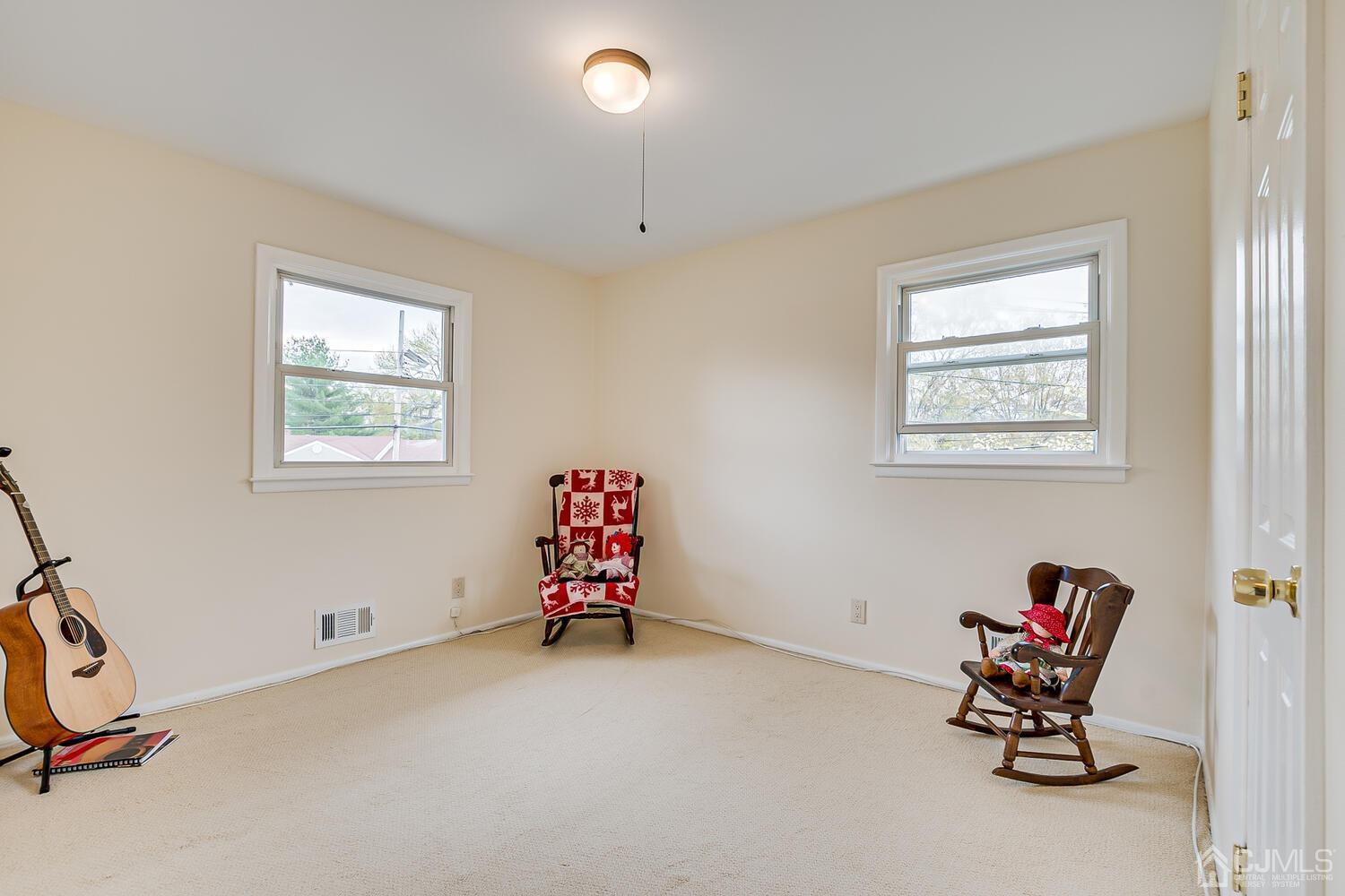 150 Vineyard Road Edison, NJ 08817 - Photo 26 of 33 a bedroom with furniture and a window