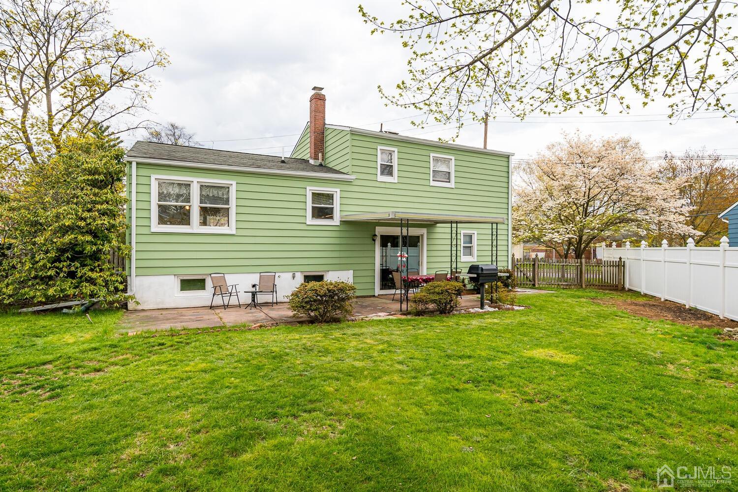 150 Vineyard Road Edison, NJ 08817 - Photo 30 of 33 a view of a house with backyard and sitting area