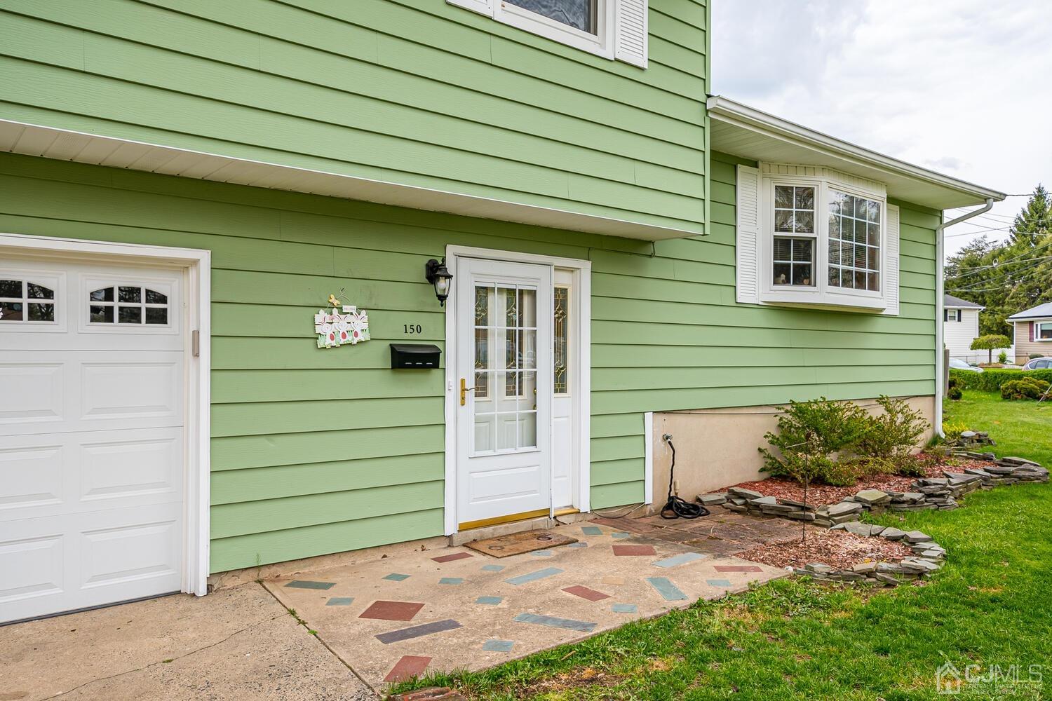 150 Vineyard Road Edison, NJ 08817 - Photo 5 of 33 a front view of a house