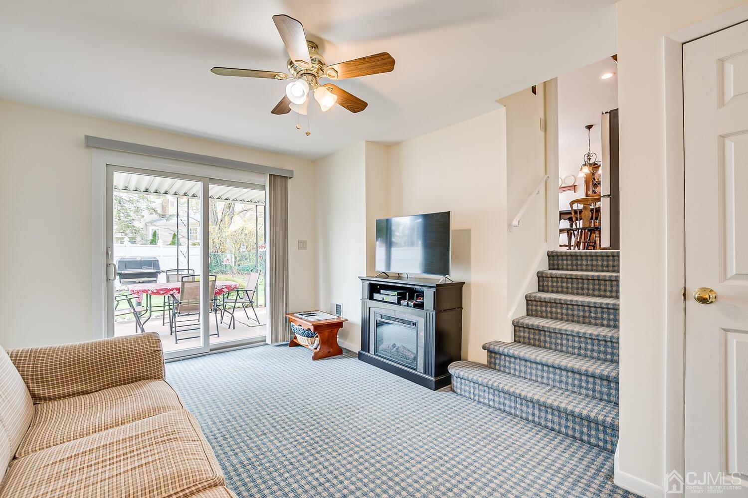 150 Vineyard Road Edison, NJ 08817 - Photo 9 of 33 a bedroom with furniture and a flat screen tv