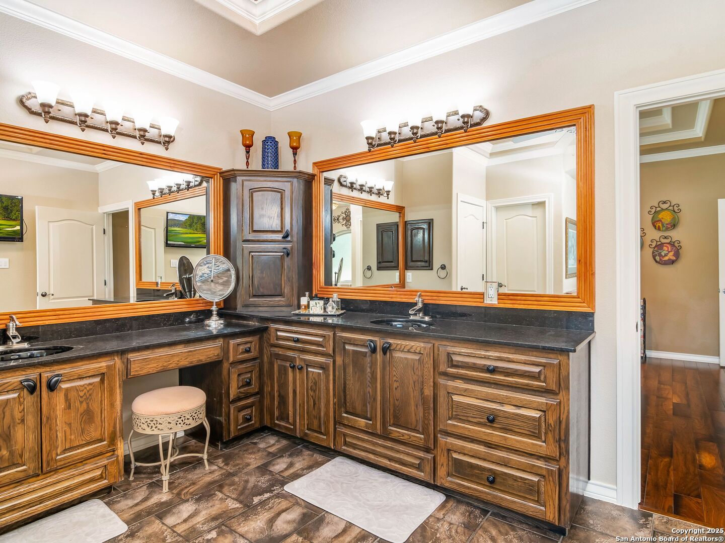 21010 Sky Ridge Avenue San Antonio, TX 78258 - Photo 22 of 70 a spacious bathroom with a sink a mirror and a bathtub