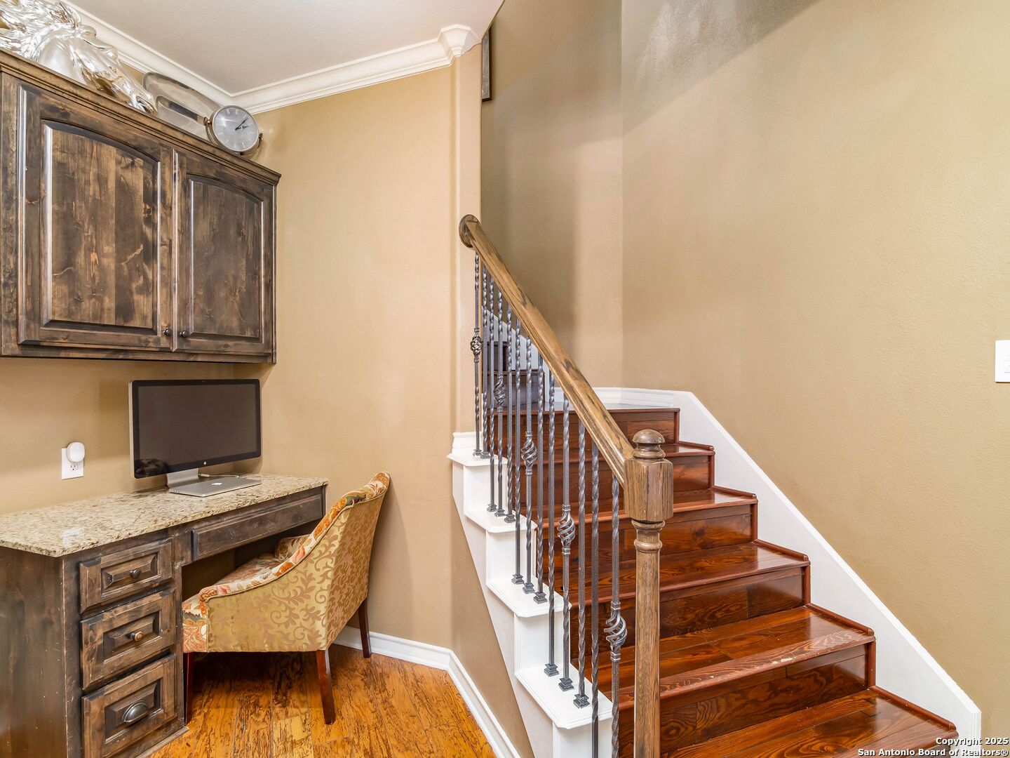 21010 Sky Ridge Avenue San Antonio, TX 78258 - Photo 25 of 70 a view of entryway with wooden floor and stairs