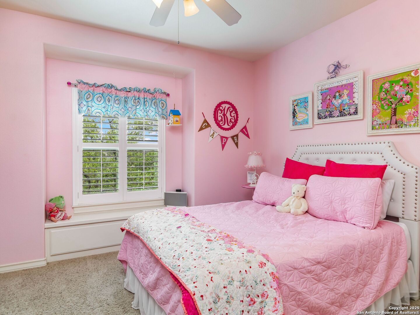 21010 Sky Ridge Avenue San Antonio, TX 78258 - Photo 30 of 70 a bedroom with a bed and a window