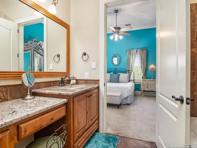 a view of a swimming pool with outdoor seating