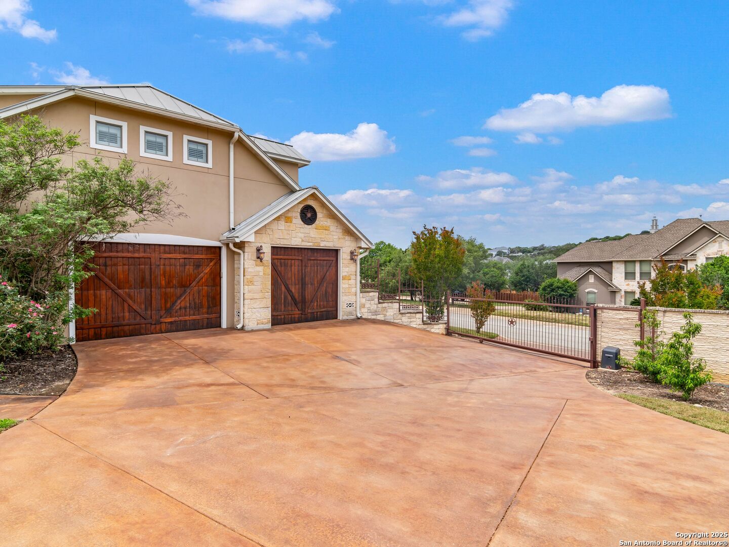 21010 Sky Ridge Avenue San Antonio, TX 78258 - Photo 44 of 70 a front view of a house with a yard and garage