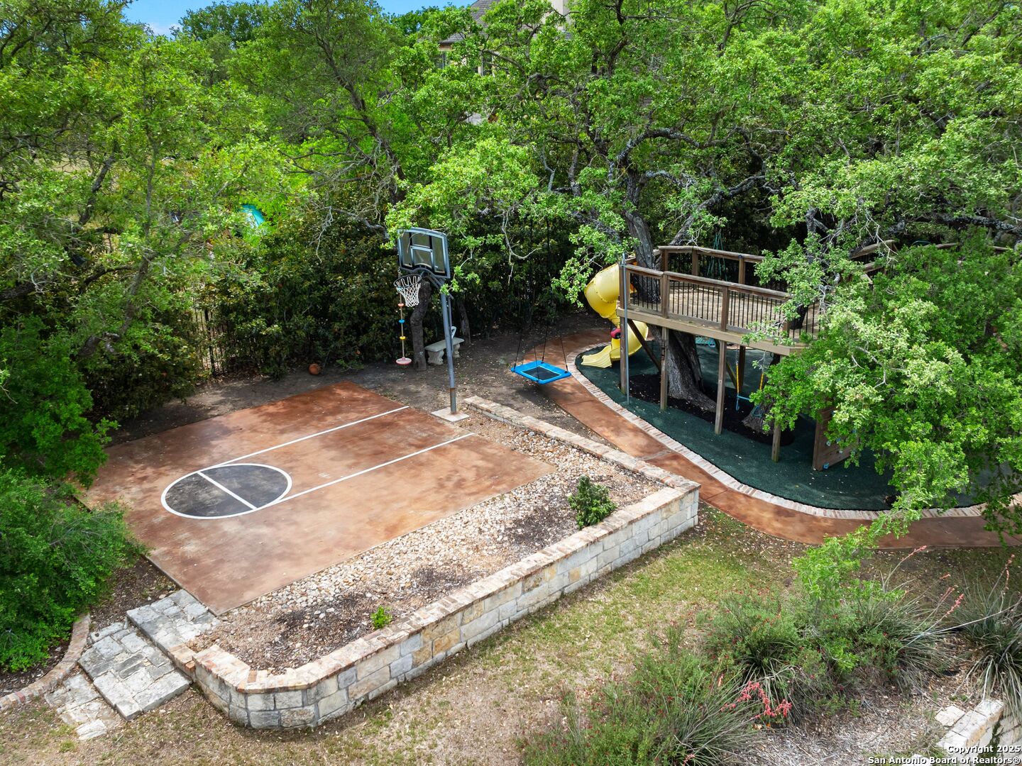 21010 Sky Ridge Avenue San Antonio, TX 78258 - Photo 65 of 70 a view of a backyard with sitting area