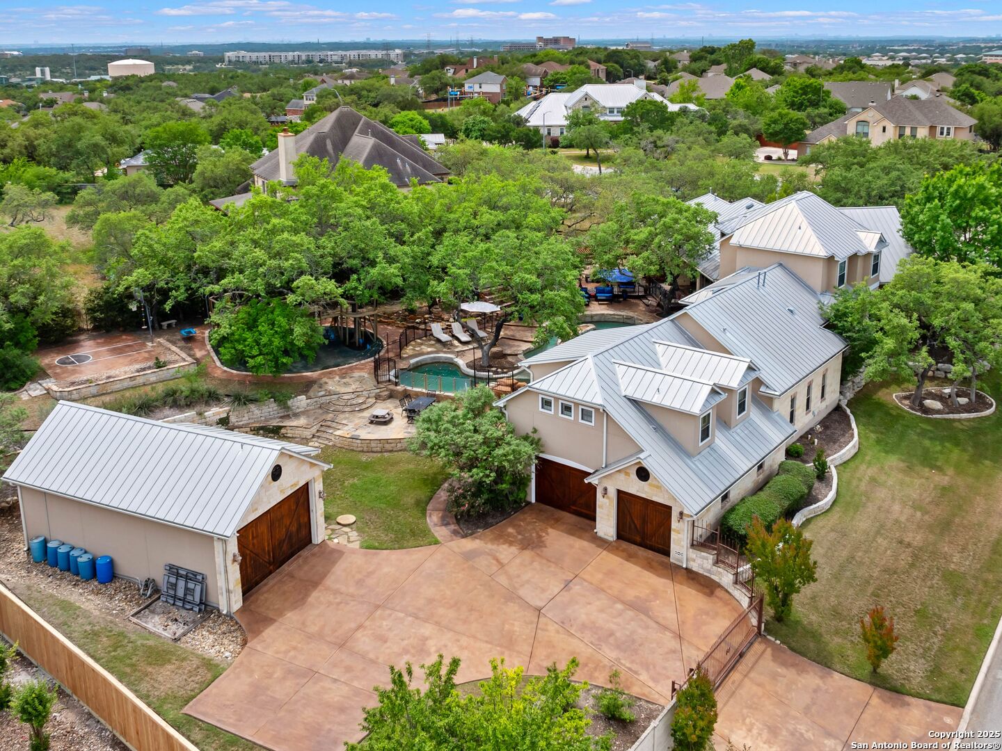 21010 Sky Ridge Avenue San Antonio, TX 78258 - Photo 67 of 70 an aerial view of a house with garden space and street view