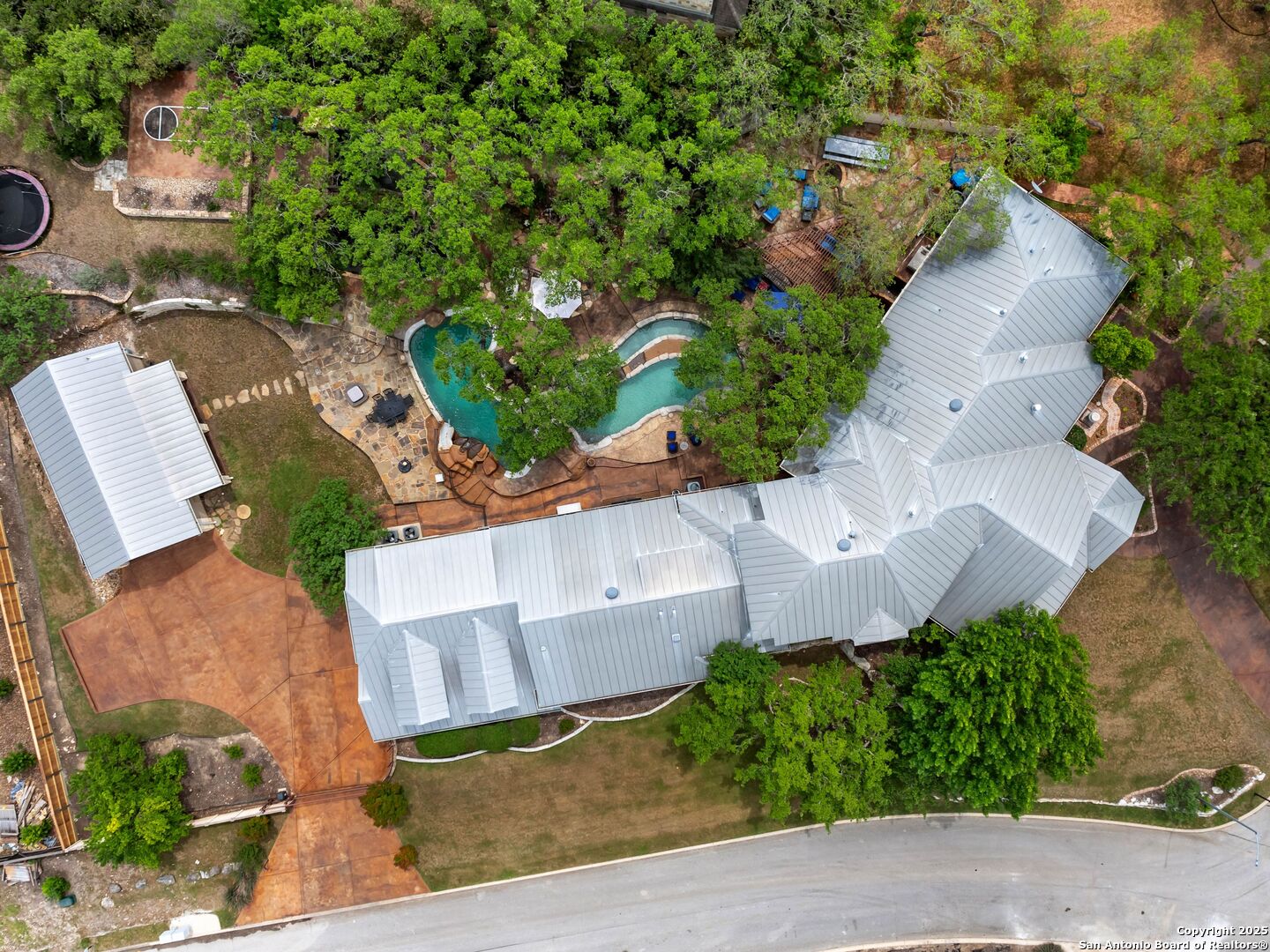 21010 Sky Ridge Avenue San Antonio, TX 78258 - Photo 70 of 70 an aerial view of a house with a yard and garden
