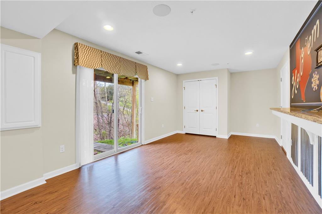 100 Arbor Trail Drive McKees Rocks, PA 15136 - Photo 19 of 22 a view of an empty room with wooden floor and a window