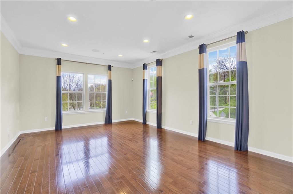 100 Arbor Trail Drive McKees Rocks, PA 15136 - Photo 4 of 22 a view of an empty room with wooden floor and a window