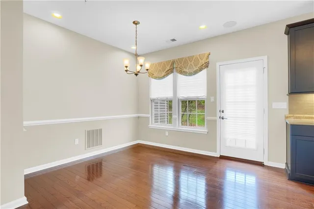 a view of livingroom with hardwood floor and window