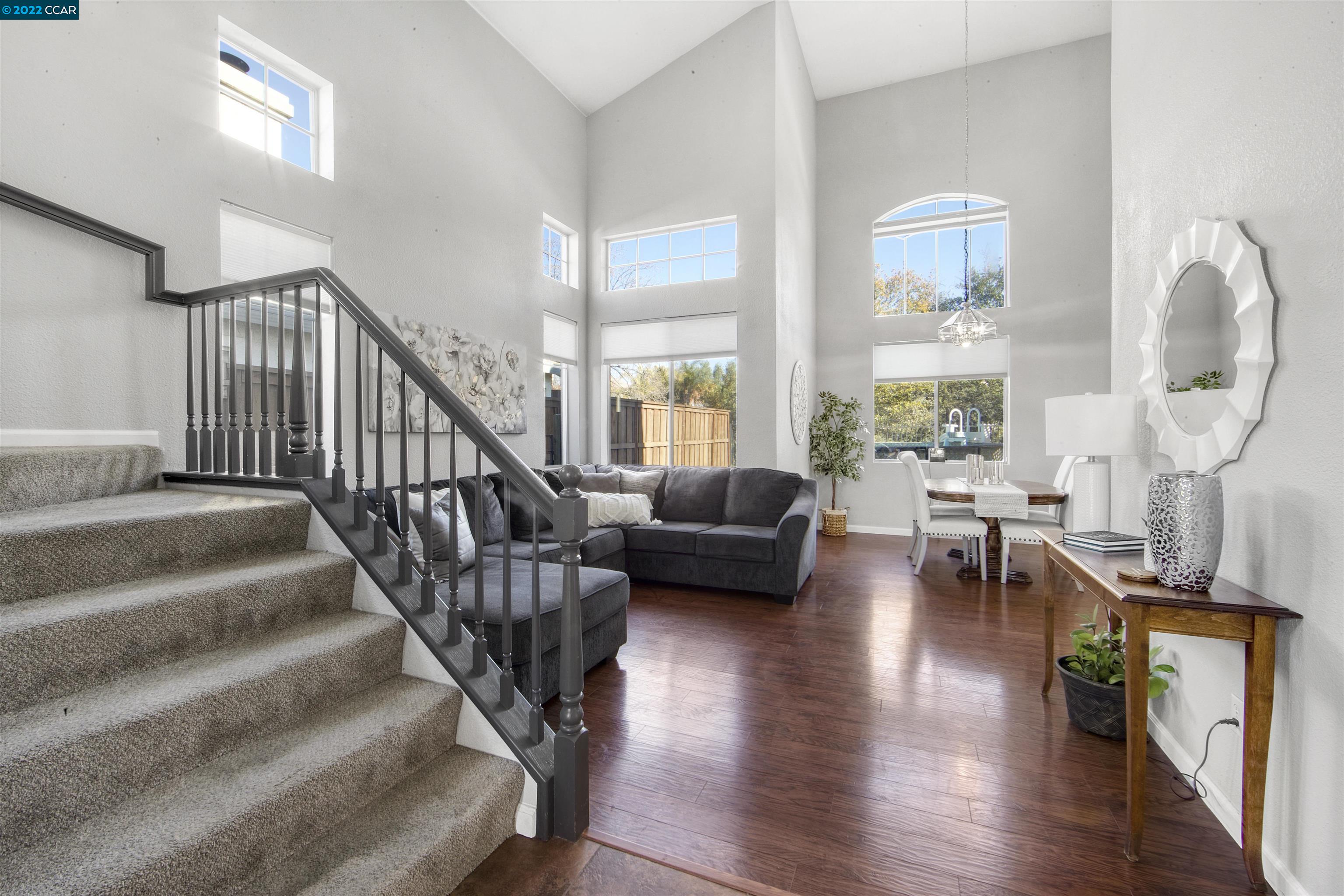 492 Apple Hill Drive Brentwood, CA 94513 - Photo 1 of 1 a living room with furniture or wooden floor and a large window